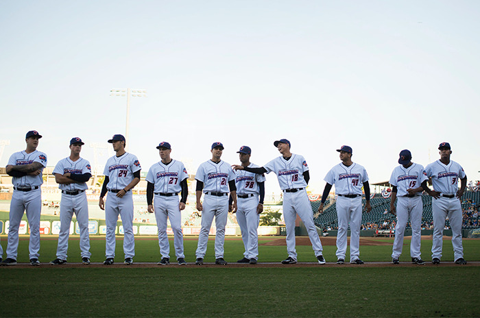 Baseball team standing on the field 
