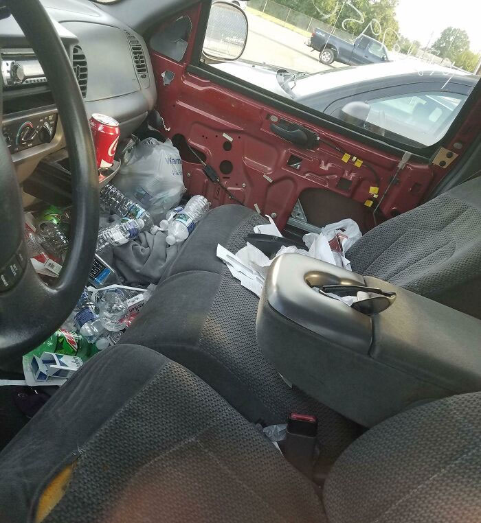The Interior Of A Coworker's Truck. Just The Tip Of The Iceberg With This Gentleman