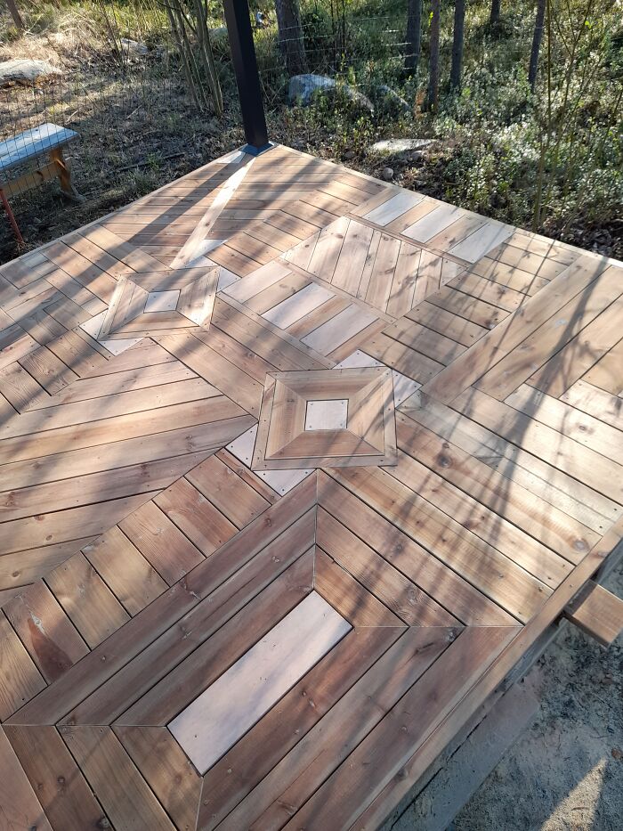 This Patio Was Built On 6 Pallets Using Leftover Bits Of Wood