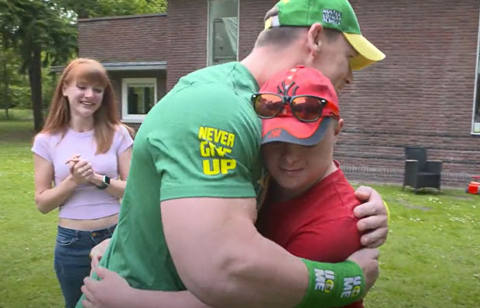 John Cena surprises a silent fan who was forced to flee Ukraine with his family
