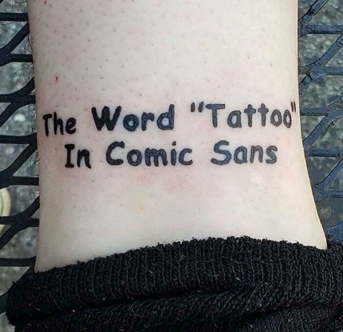 The Word Tattoo In Comic Sans