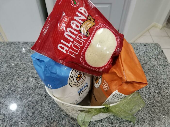 I Am Picking My Wife Up At The Airport After A Long Trip. A Friend Said To Bring Her Some Nice Flours As A Surprise. I Am Bringing Her A Basket Full Of Her Favorite Flours