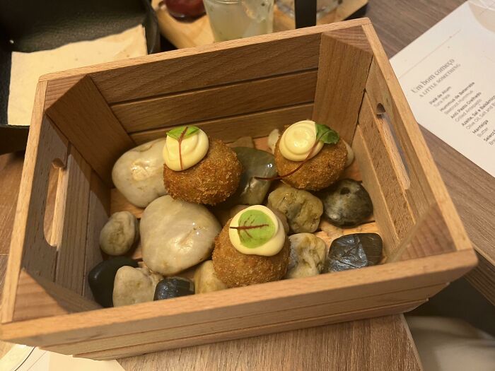 Croquette In A Box Among Rocks
