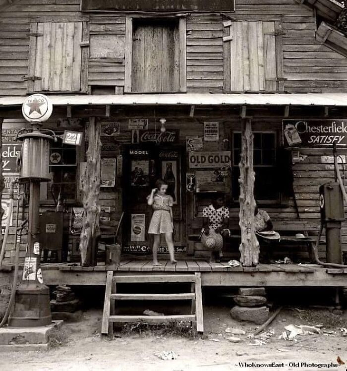“Daughter Of White Tobacco Sharecropper At Country Store. Person County, North Carolina.” By Dorothea Lange - July, 1939.