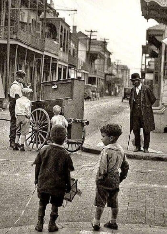 Bourbon Street And Ursulines Avenue Circa 1925. “New Orleans Organ Grinder.” By Arnold Genthe.