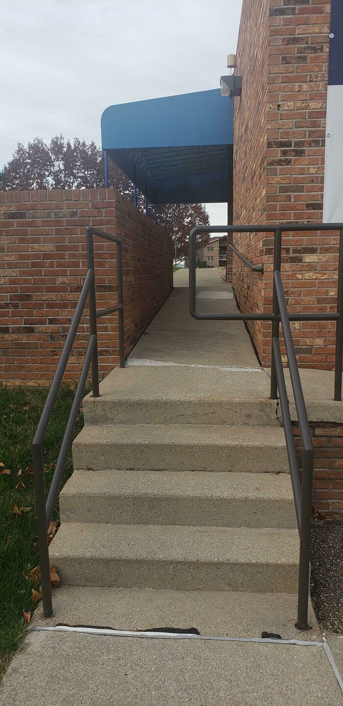 University Stairway Leads Halfway Into Hand Rail