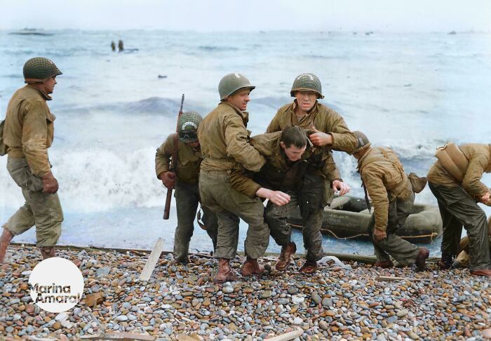 Us Medics Help Wounded Soldiers On Omaha Beach On D-Day.