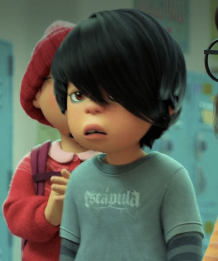 In Turning Red (2022), This Boy Is Wearing A Shirt For A Band Called "Escapula". This Is A Reference To Coco (2017), Where Escapula Was One Of The Bands That Performed In A Contest