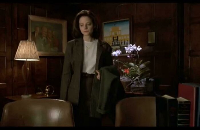 In The Opening Scenes Of The Silence Of The Lambs (1991), Clarice Starling Is Continually Surrounded By Men, And We Repeatedly Experience The Male Gaze From Her Pov. In Dr. Chilton’s Office She Is Framed By A Painting Of Four Men And Many Well Lit Orchids. “Orchid” Comes From The Greek For Testicle