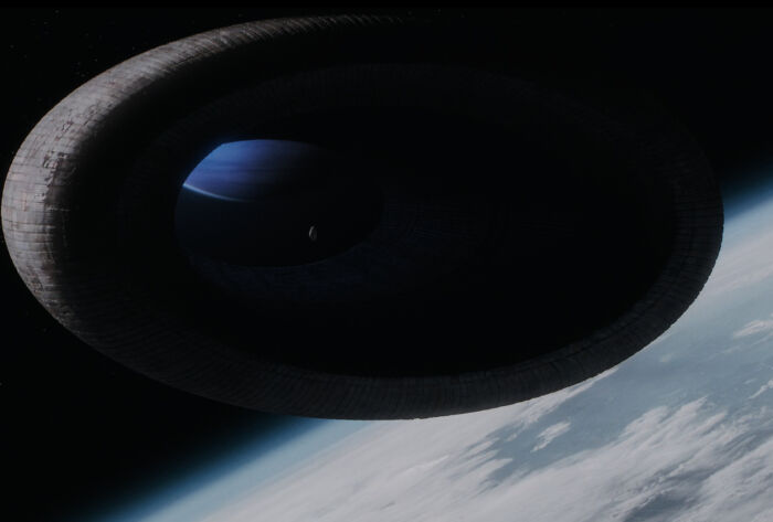 Dune (2021) - The Spacing Guild Ships Used For Interstellar Travel Can Fold Space. Villeneuve Shows This Technology Briefly When We See Another Planet Inside The Center Of The Spacefolder When The Bene Gesserit Come To Caladan
