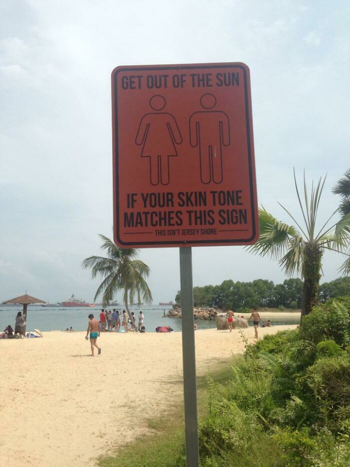 Warning Sign On Singapore Beach. "This Isn't Jersey Shore"
