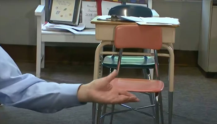 A teacher has held an empty chair in her classroom for over 50 years as a symbol of acceptance and inclusion