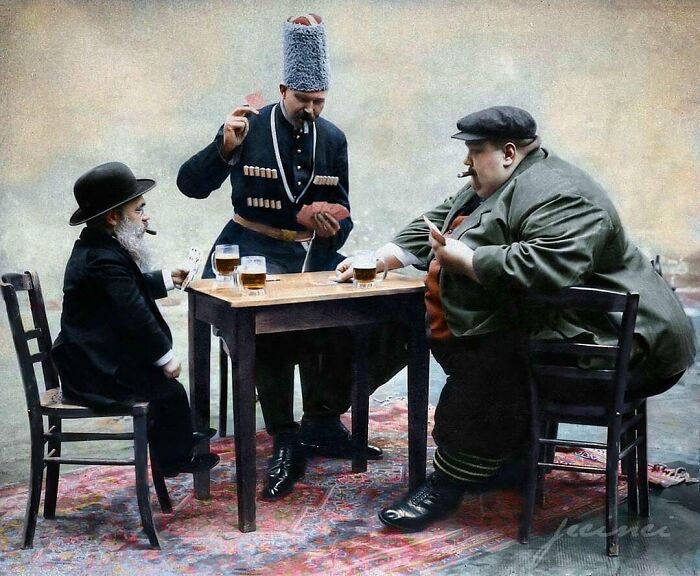 The Tallest (Cornelius Bruns), Shortest (Unknown), And Fattest (Cannon Colossus) Men In Europe Playing Cards And Drinking Together In 1913