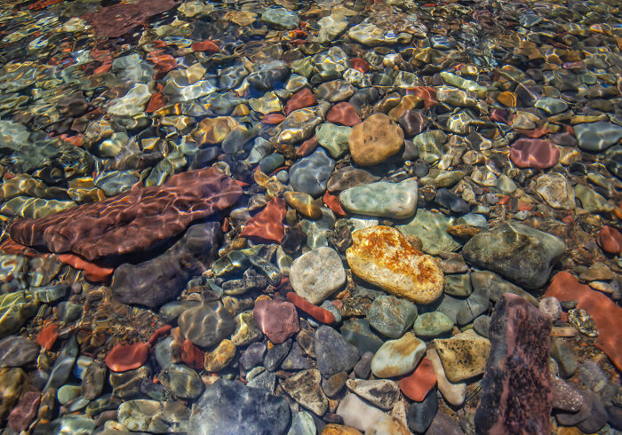 Rocks Looking Vibrant And Joyous In A Mountain Stream
