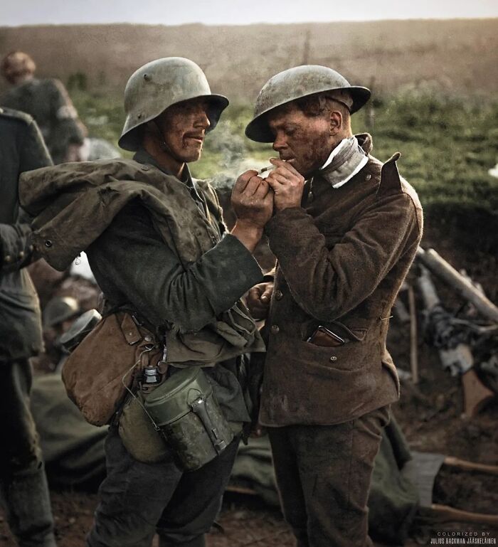 A Wounded British Soldier And A German Pow Lighting Cigarettes At An Advanced Dressing Station Near Epehy, France On The 18 September 1918