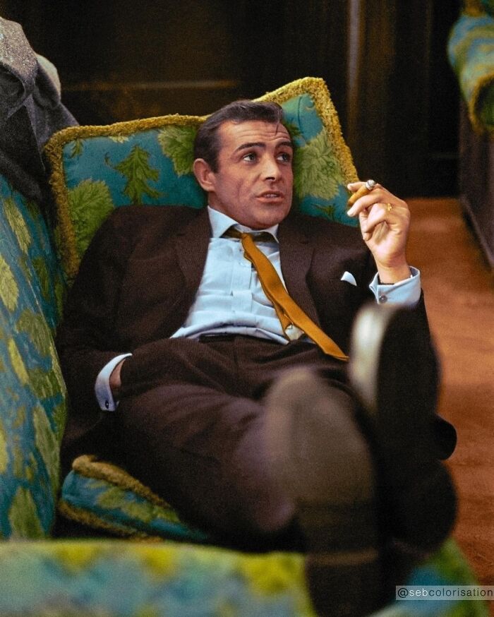 Legendary Actor Sean Connery Photographed Laying On A Sofa While Smoking A Cigarette In London, United Kingdom On The 8 October 1963. He Was In London For The Filming Of The Crime Thriller "Woman Of Straw"