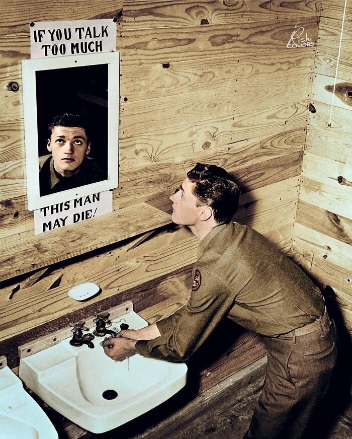 A Soldier Looking At A Mirror With A Sign Reading "If You Talk Too Much, This Man May Die". At Camp Hood, Texas In January 1943. The Sign Was Placed There To Encourage People To Not Spread Information That Might Be Sensitive In The War Effort During World War II