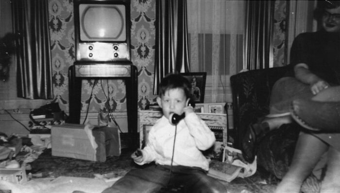 First Time Post. My Oldest Brother Making A Call On His Play Phone, Christmas- Late Fifties/Early Sixties. Check Out The Muntz TV. Still Had It When I Was Born 7 Years Later.