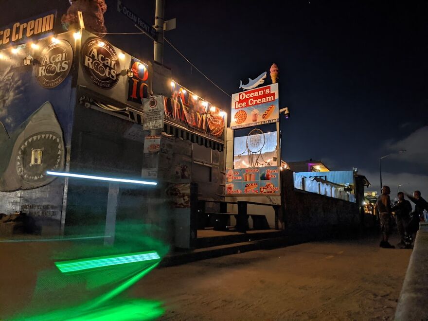 Night Life On The Beach Walk. Looks Almost Carnival (Cellphone)