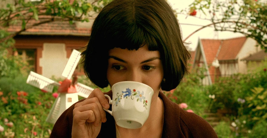 Amélie movie main actor drinking from a white cup