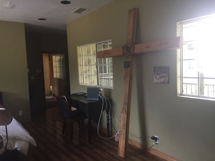 'A life-size crucifix in one of the bedrooms': Airbnb guest was stunned to find her entire rental home filled with Christian decor