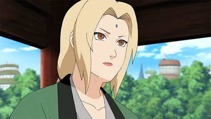 Female anime character with blonde hair and a diamond-shaped mark on her forehead, standing in front of a scenic backdrop.