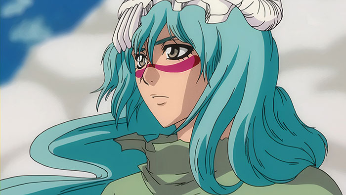 Female anime character with turquoise hair and a skull headpiece, gazing into the distance.