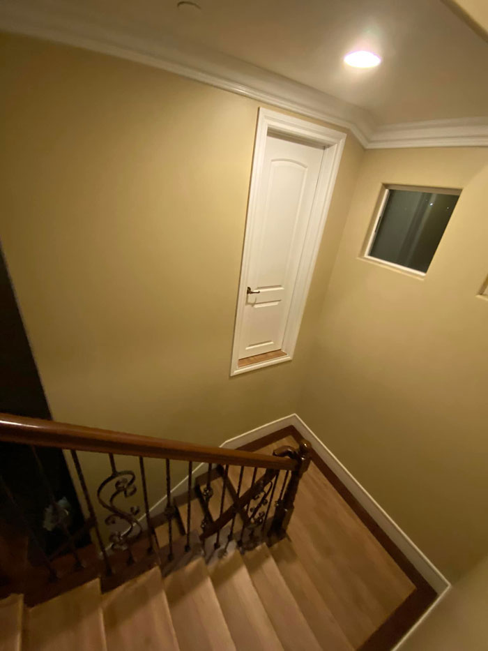 Staying At An Airbnb Home In Pasadena In A Newer Gated Community And The Layout Makes No Sense. A 7’ Door In The Middle Of The Stairway That You Need To Stand On A Chair To Get To