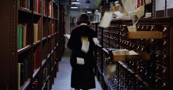 librarian-in-the-library-with-her-back-turned-to-cards-from-card-catalog-flying-in-ghostbusters-film-still-feature-700x375-1jpgoptimal-62bc0733d42ce.jpg