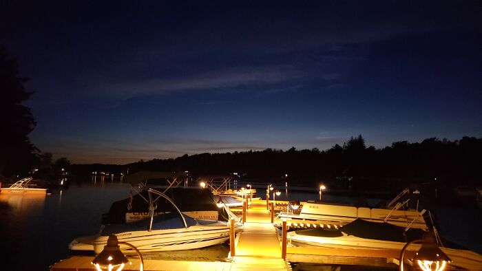 Watching The Sunset Over Lake Harmony On The Dock. Lake Harmony, Pa, USA