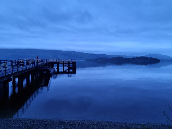 A Different Kind Of Beach: Pier And Beach On A Rainy Evening At Loch Lomond In Scotland