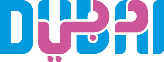 The Logo Of Dubai Shows The Name Of The City In English And Arabic At The Same Time