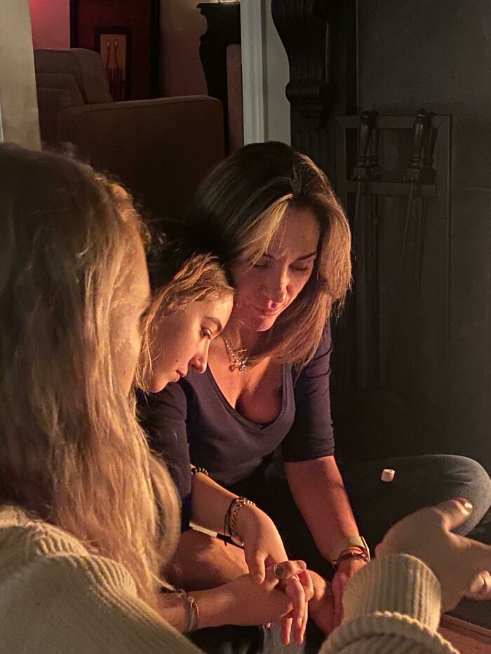 My Mom And Sister In Front Of The Fireplace