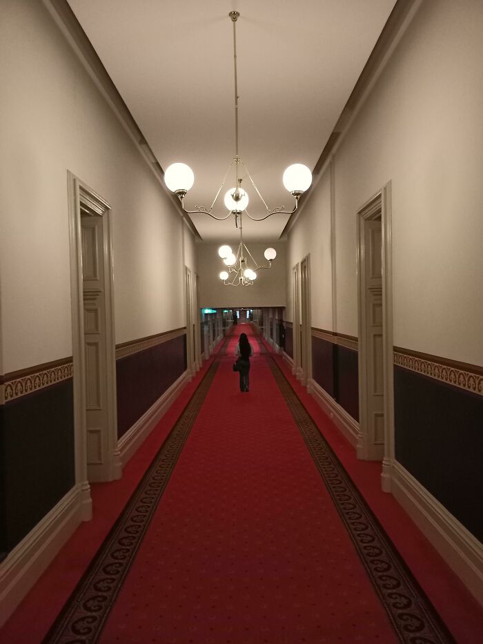 Hotel Hallway Makes Her Look Tiny