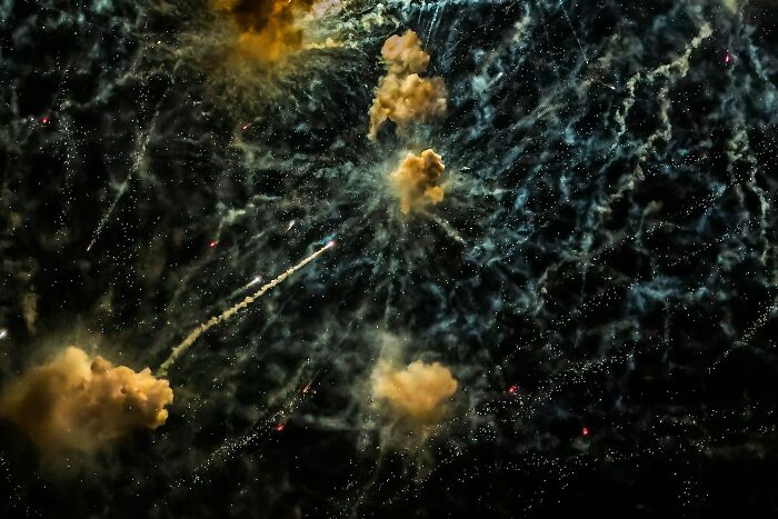 Capturing Fireworks With A Fast Exposure Makes Them Look Like A Space Nebula