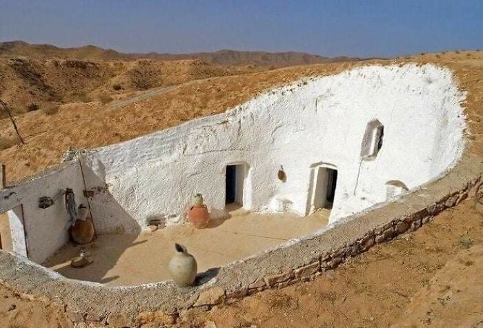 A Traditional Medieval Cave House With A Courtyard Found In The Desert Of Libya