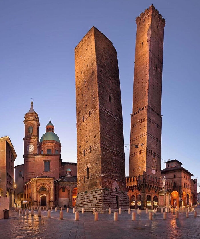 The Two Towers Of Garisenda And Degli Asinelli Are Commonly Recognized As Symbols Of Bologna And Were Built Between 1109 And 1119