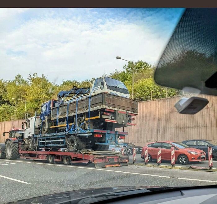 A Tractor Carrying A Truck, Carrying A Truck, Carrying Another Truck