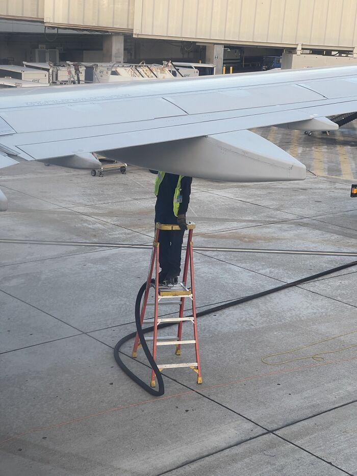 Standing On The Fueling Nozzle To Get That Extra Reach