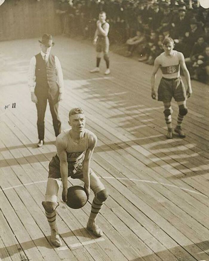 An Atlanta Boy’s High School Basketball Player Shooting A Free Throw Against Tech High School In 1921 