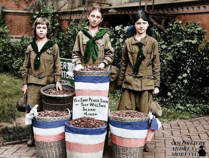 [colorized] Three Scout Girls Collect Peach Pits, Which Will Later Be Processed To Make Gas Mask Filters During World War I. Washington, 1917-1918