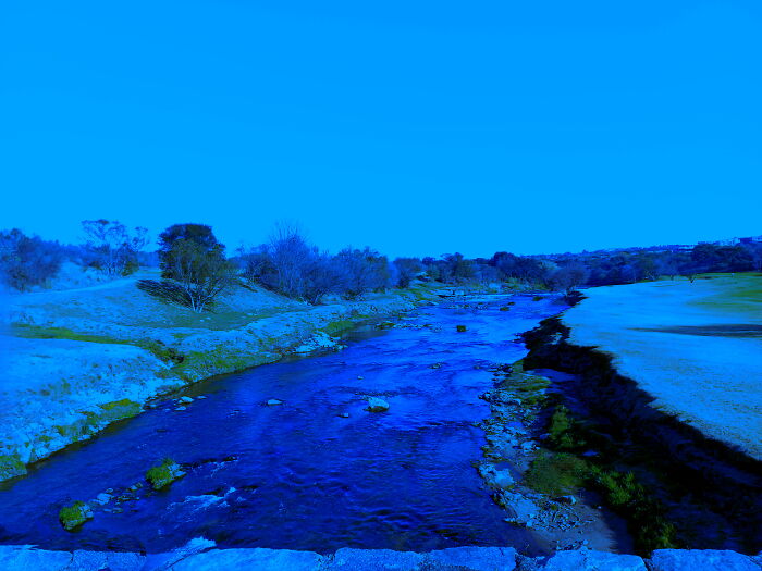 Snowfall By The Stream