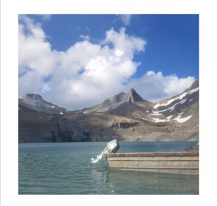 Swimming In A Cool Lake In The Swiss Mountains.