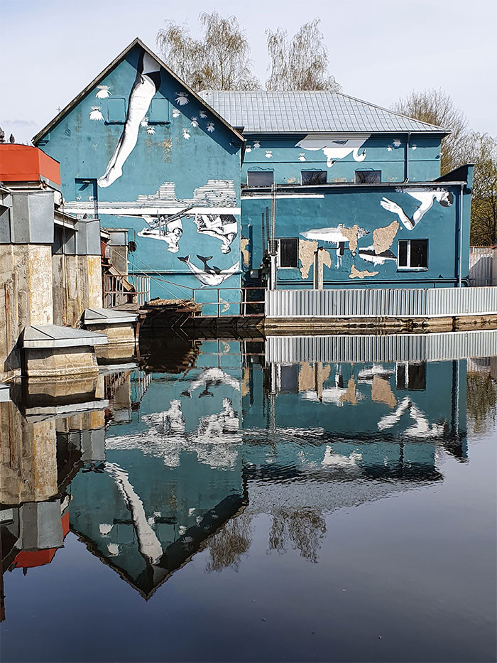 Mural Painted Upside Down For Reflection In Marijampole, Lithuania