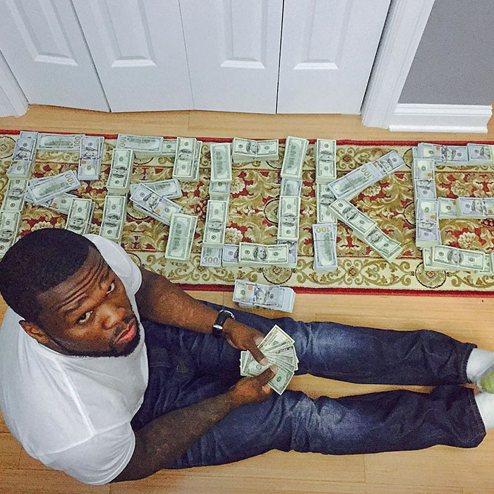 50 Cent Showed Off His Wealth By Posting A Photo On Instagram And Spelling Out "Broke" In Stacks Of Hundreds