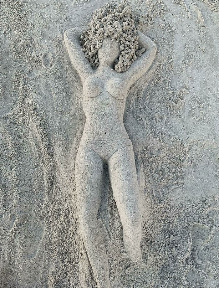 Sand Sculpture Of A Girl That I Found On The Beach