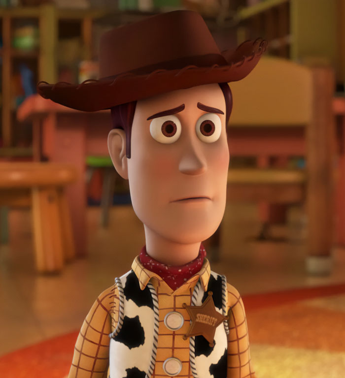 Woody wearing brown hat 