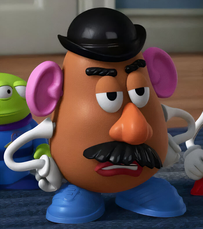Mr. Potato Head wearing black hat 