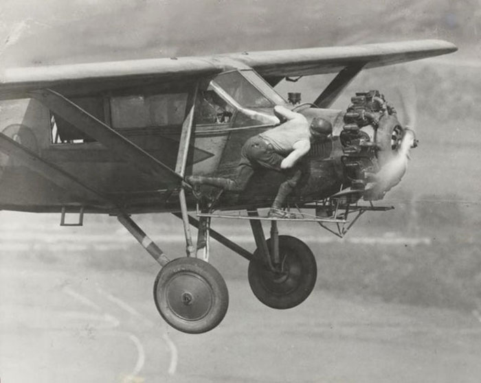 The Hunter Brothers Doing Some Mid-Air Mechanical Checkups During Their 23 Day-Long Flight (Without Landing) In 1930. Food And Fuel Were Delivered To Them Periodically By Another Airplane