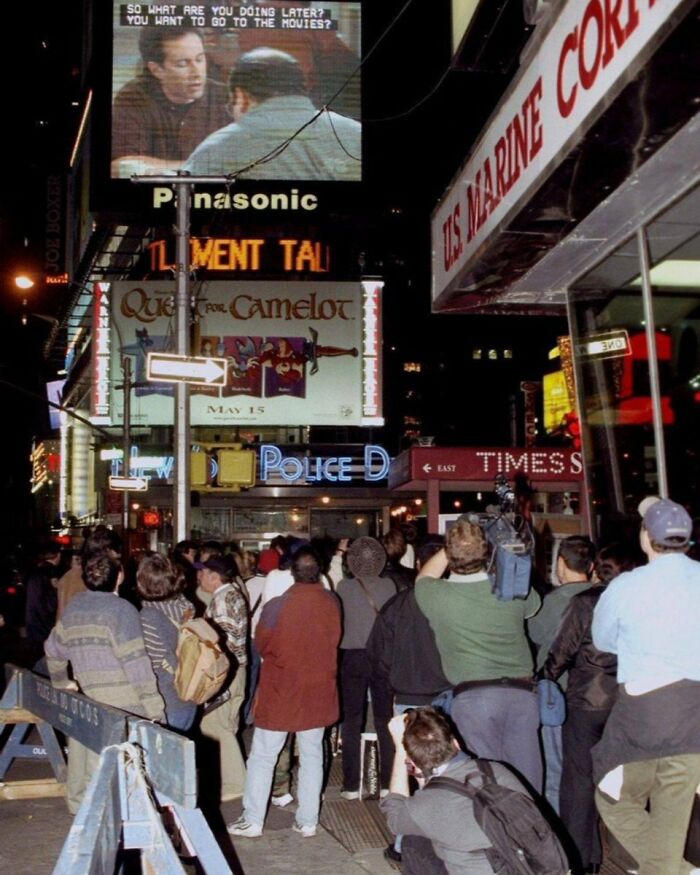 New Yorkers Stop To Watch The "Seinfeld" Finale In Times Square, 1998. Photo By Ken Murray